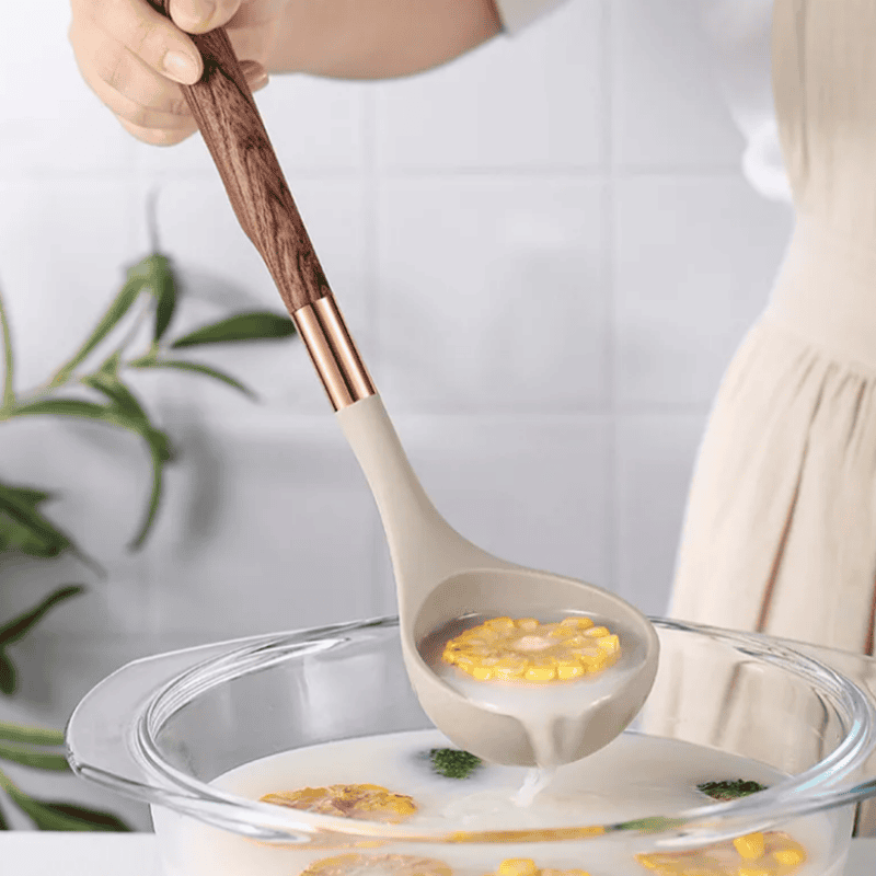 "10 stykker elegant silikone køkkenredskabssæt med træhåndtag, ideelt til stilfuld og effektiv madlavning."