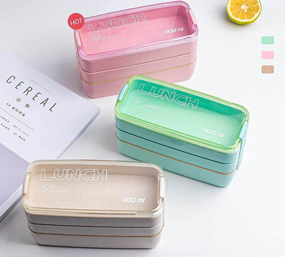 "3-lags bento madkasse i beige og lyserød, lufttæt, mikrobølge- og opvaskemaskinesikker, ideel til frokostopbevaring."