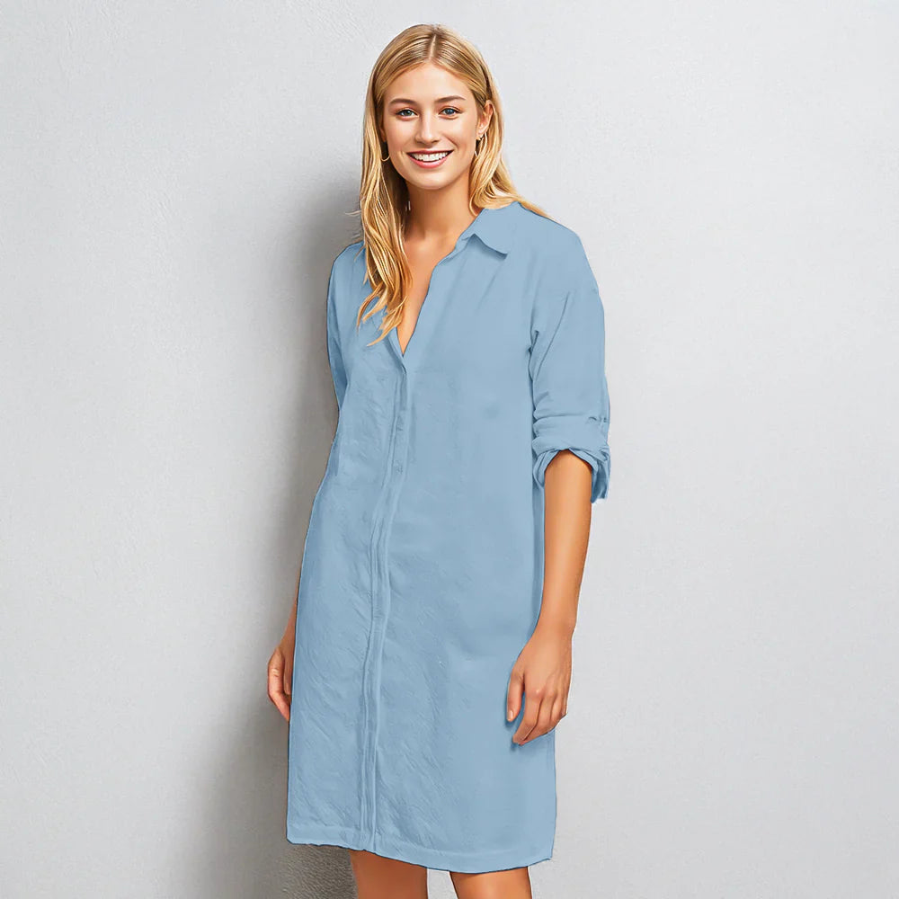 "Angelina skjortekjole i let stof, halv ærmer og knaplukning. Perfekt til hverdag og semi-formelle lejligheder."