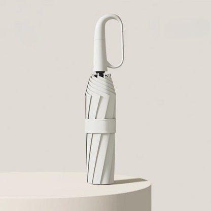 "Automatisk vindtæt paraply med reflekterende kant, åben og klar til brug mod regnen med robust design og synlighed."