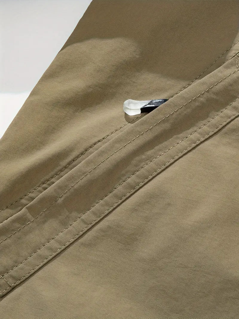 "Blå vandtæt og åndbar herrejakke til eventyr, set bagfra med langærmet design og aftagelig hætte, perfekt til udendørs"