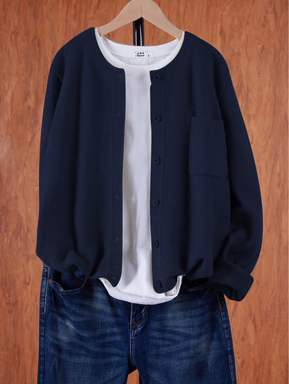 "Blød oversized uld strikcardigan til kvinder, elegant og komfortabel med afslappet pasform og praktiske lommer."