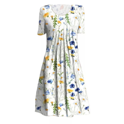 "Blomstret sommer midi kjole, let stof, afslappet pasform, lommer, feminint design, perfekt til varme dage"