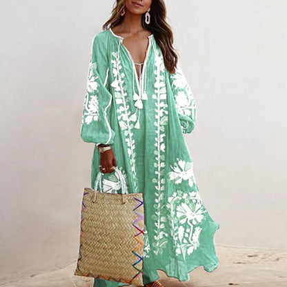 Boheme Blomster Maxi Kjole med lange ærmer, gule blomster, let materiale, afslappet og elegant look til sommer.