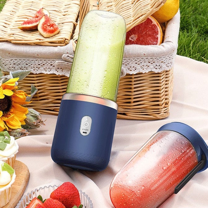 "Citruspresser i moderne design, kompakt og bærbar, effektiv juicing af frugt i køkkenet eller på farten"