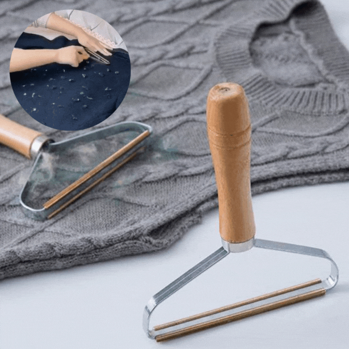 "Effektiv håndholdt fnugfjerner, kompakt design, miljøvenlig, fjerner fnug og dyrehår fra tøj, tæpper og sengetøj."