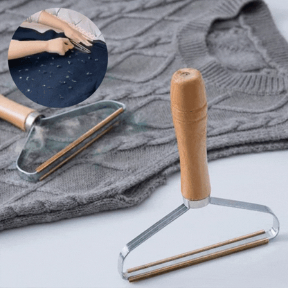 "Effektiv håndholdt fnugfjerner, kompakt design, miljøvenlig, fjerner fnug og dyrehår fra tøj, tæpper og sengetøj."