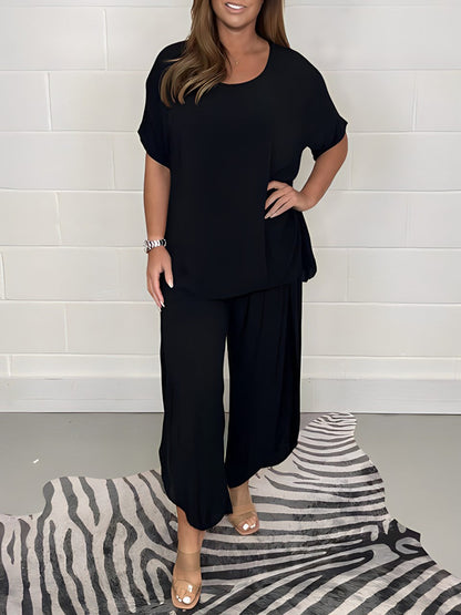 Elegant Alma to-delt kvindesæt i bløde materialer, tidløst design med overdel og underdel, til formelle og afslappede anledni