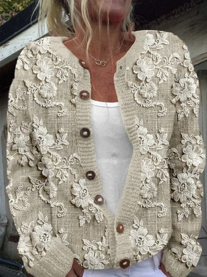 "Elegant blomstrede strikjakke til damer, front view, med farverige blomstermønstre, ideel til både arbejds- og fritidsbrug."