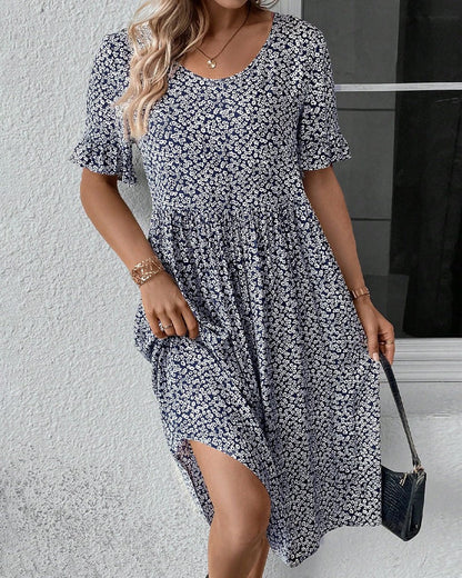 "Elegant blomstret midi-kjole med flæseærmer til kvinder i flere farver, ideel til både fest og hverdag."