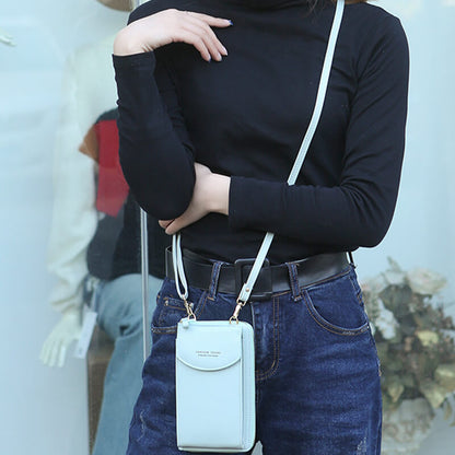 "Elegant crossbody taske i PU-læder med guldfarvede beslag og justerbar rem, ideel til hverdagsbrug og festlige lejligheder."