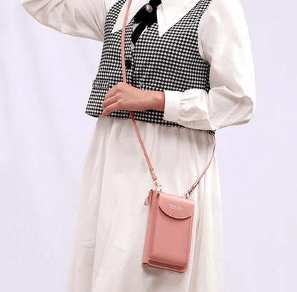 "Elegant crossbody taske i PU-læder med guldfarvede beslag og justerbar rem, ideel til hverdagsbrug og festlige lejligheder."