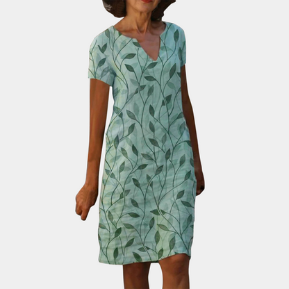 "Elegant grøn sommerkjole til kvinder, let og luftig med trendy design, perfekt til sommerens begivenheder."