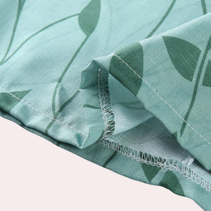 "Elegant grøn sommerkjole til kvinder, let og luftig med trendy design, perfekt til sommerens begivenheder."