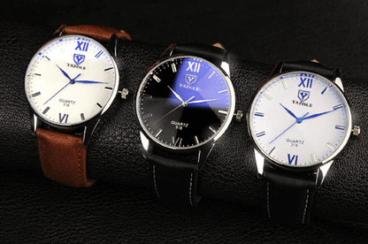 "Elegant herreur med sort læderrem og romertalsskive, klassisk design til forretning og fritid."