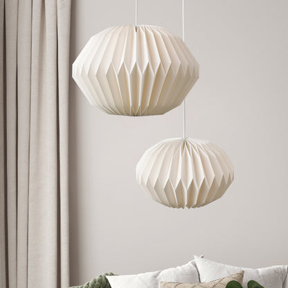 "Elegant hvid Moon Hexagon pendel i akryl med geometrisk design, jævn lysspredning og blød belysning, perfekt til stue."