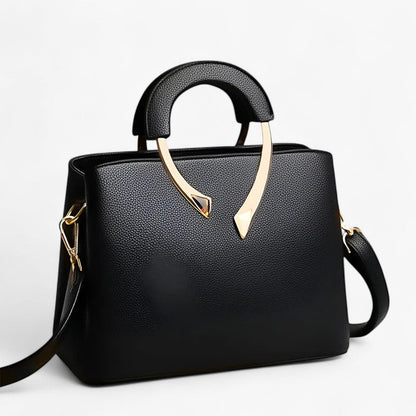 "Elegant læder tote til kvinder med rummelige lommer, tidsløst design og justerbar skulderrem for stil og komfort."