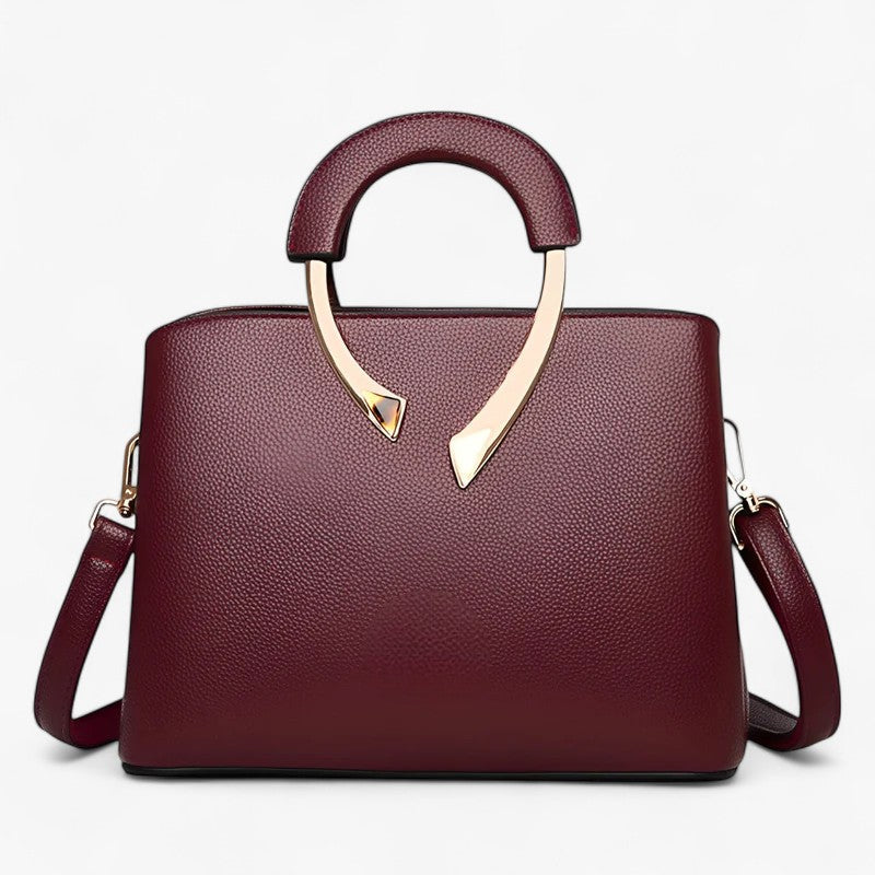 "Elegant læder tote til kvinder med rummelige lommer, tidsløst design og justerbar skulderrem for stil og komfort."