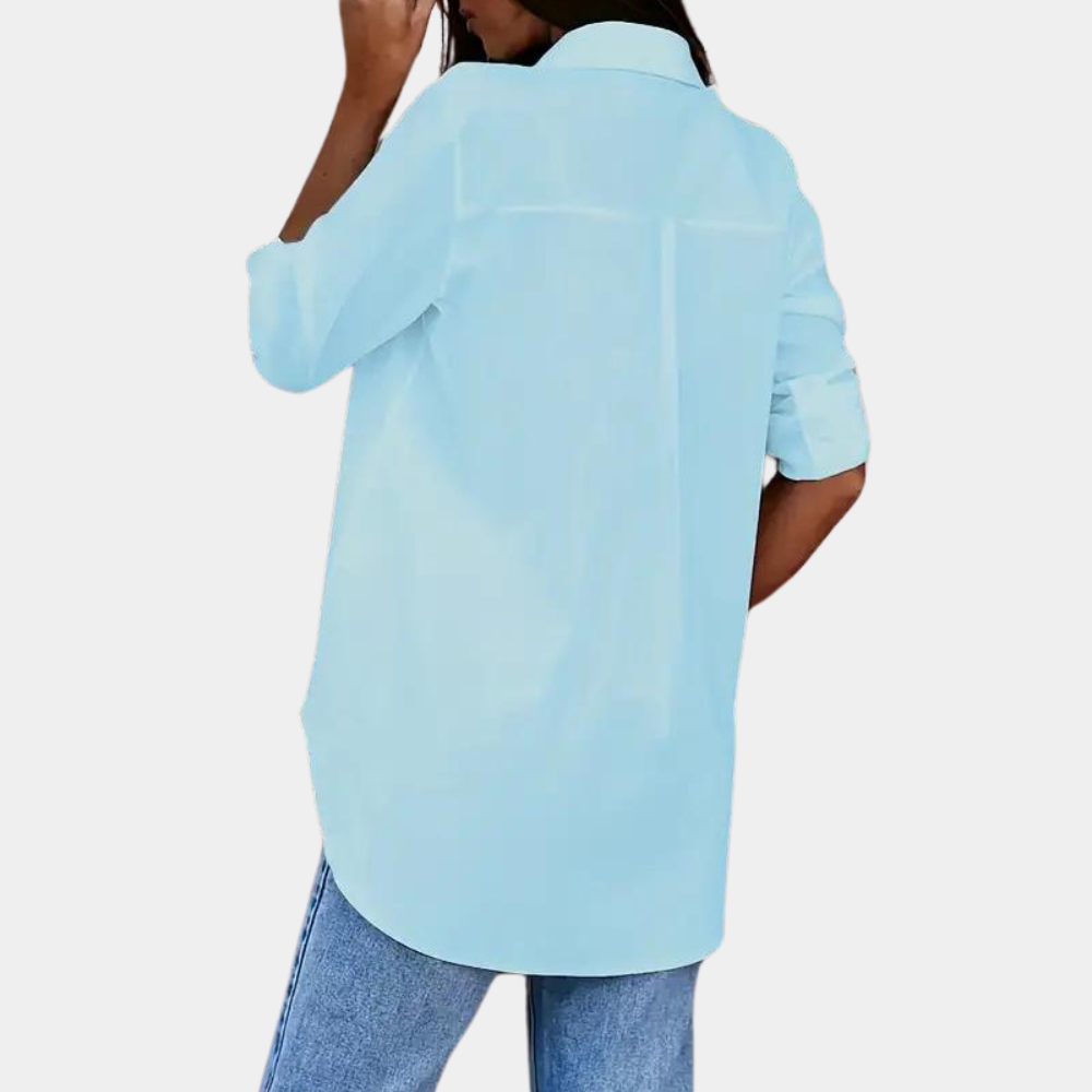 "Elegant lyseblå langærmet bluse til kvinder, feminin og behagelig, perfekt til hverdag og festlige lejligheder."