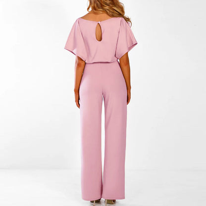 "Elegant mørkeblå kvinders jumpsuit med flatterende silhuet, perfekt til både hverdag og formelle anledninger."