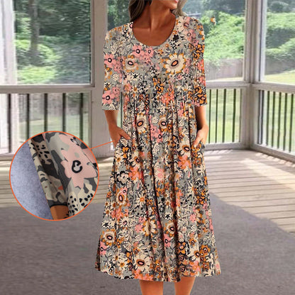 "Elegant Una midikjole i blødt stof, løs pasform, klassisk midilængde, perfekt til både hverdag og aftenbrug."