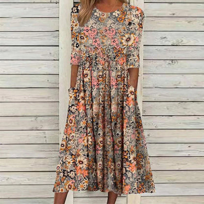 "Elegant Una midikjole i blødt stof, løs pasform, klassisk midilængde, perfekt til både hverdag og aftenbrug."