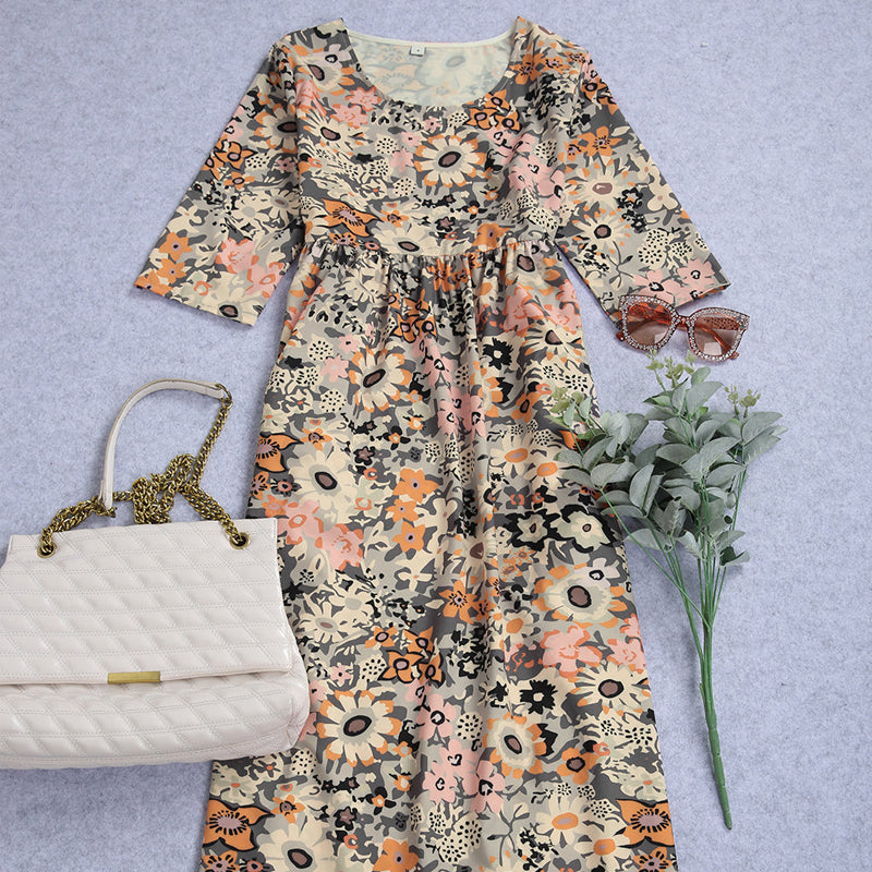 "Elegant Una midikjole i blødt stof, løs pasform, klassisk midilængde, perfekt til både hverdag og aftenbrug."