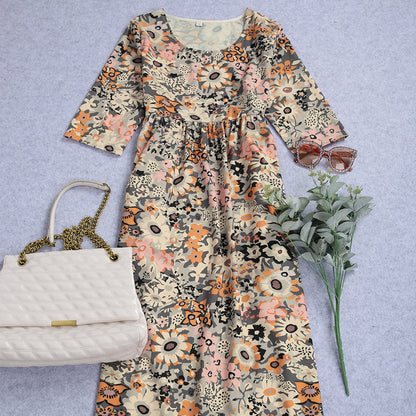 "Elegant Una midikjole i blødt stof, løs pasform, klassisk midilængde, perfekt til både hverdag og aftenbrug."