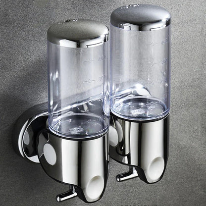 "Elegant vægmonteret sæbedispenser med dobbelt rum, minimalistisk design, gennemsigtige sektioner for nemt overblik."