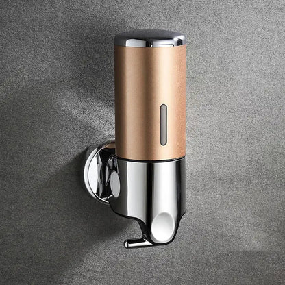 "Elegant vægmonteret sæbedispenser med dobbelt rum, minimalistisk design, gennemsigtige sektioner for nemt overblik."