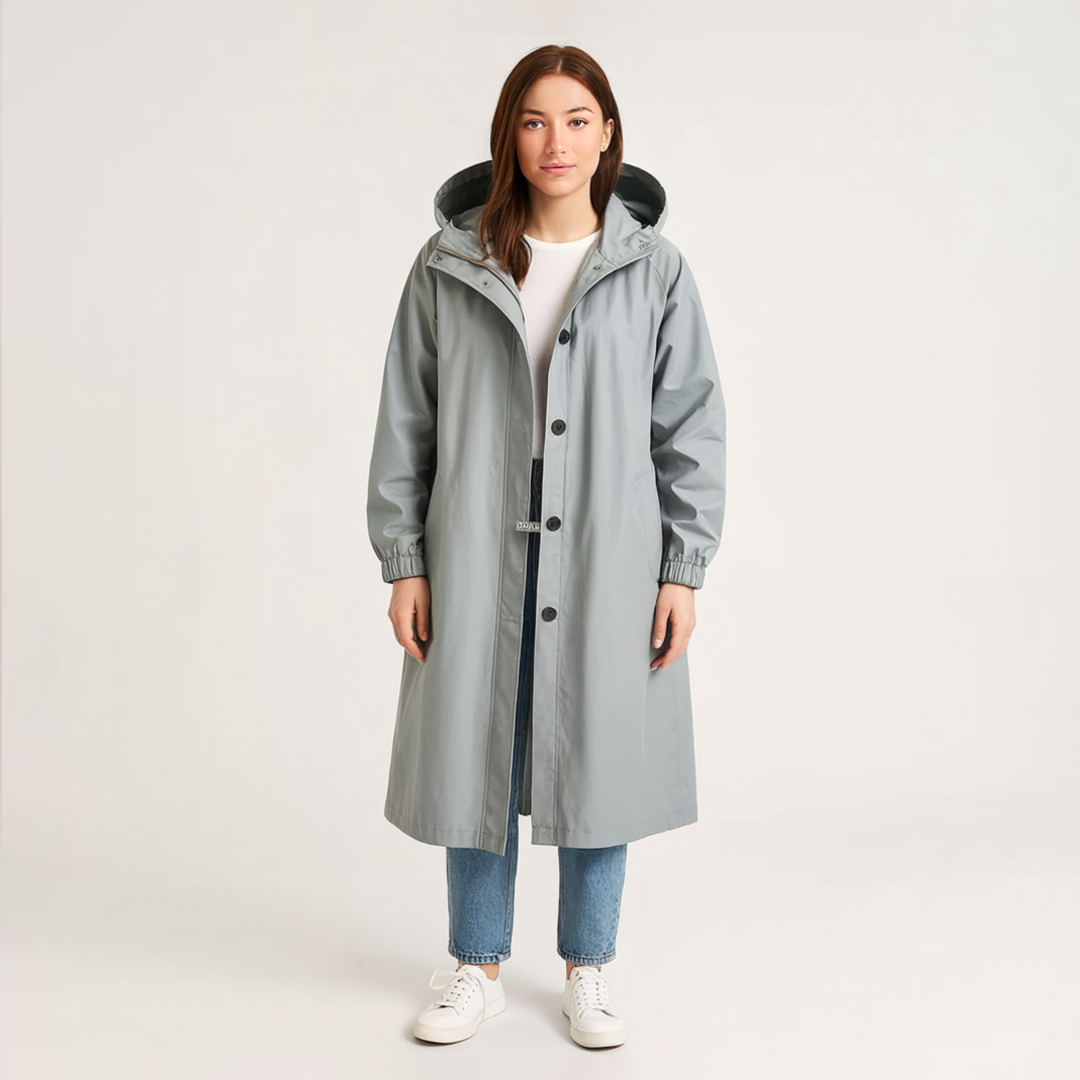 "Elegant, vandafvisende trenchcoat til kvinder i klassisk design, med bælte og lommer, velegnet til overgangsvejr."