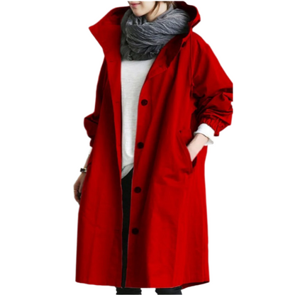 "Elegant, vandafvisende trenchcoat til kvinder i klassisk design, med bælte og lommer, velegnet til overgangsvejr."