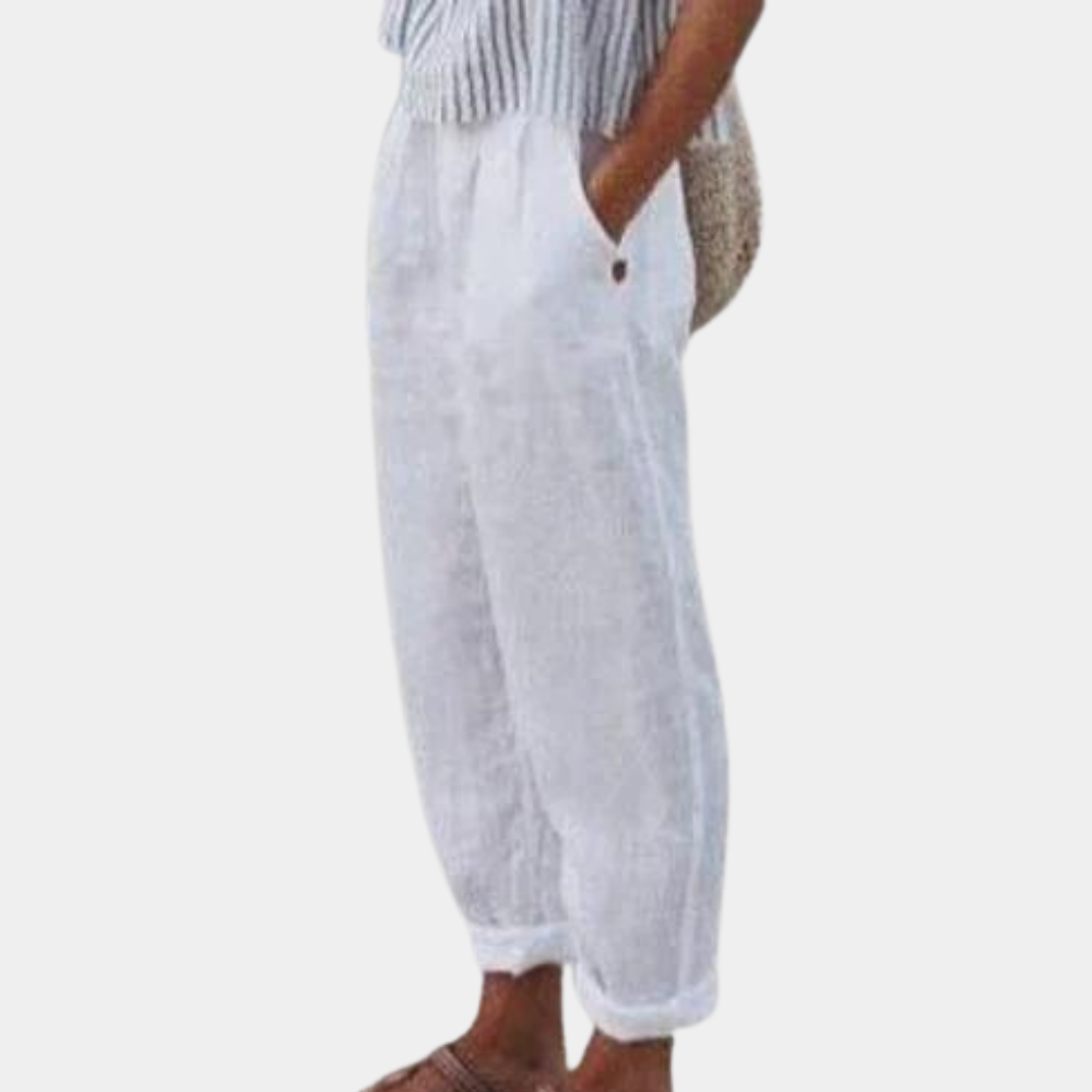 "Elegante forårsbukser til kvinder med høj talje, lige ben, elastisk linning og praktiske lommer, set forfra."