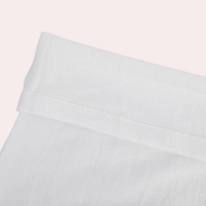 "Elegante forårsbukser til kvinder med høj talje, lige ben, elastisk linning og praktiske lommer, set forfra."