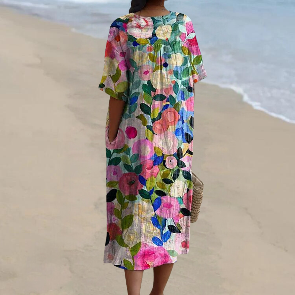 "Farverig forårskjole til kvinder med livligt blomstret print, ideel til elegante og afslappede lejligheder"