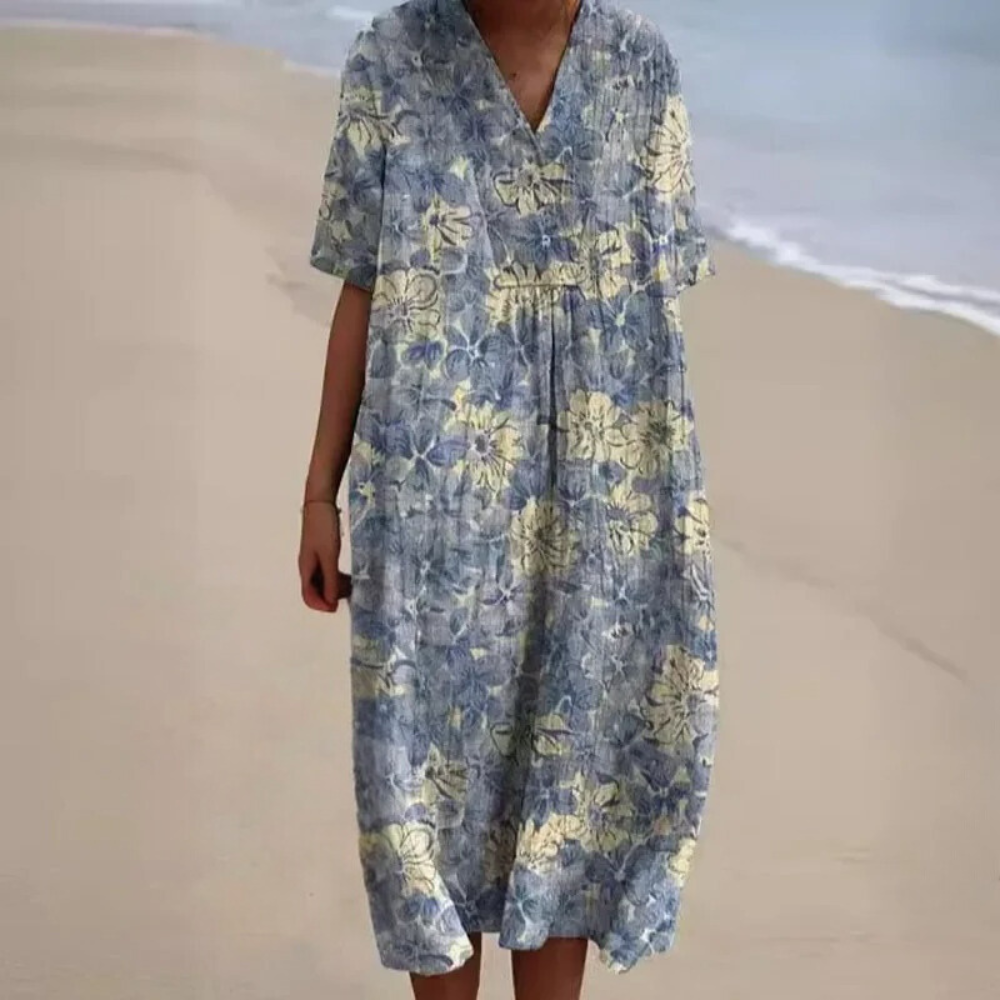 "Farverig forårskjole til kvinder med livligt blomstret print, ideel til elegante og afslappede lejligheder"