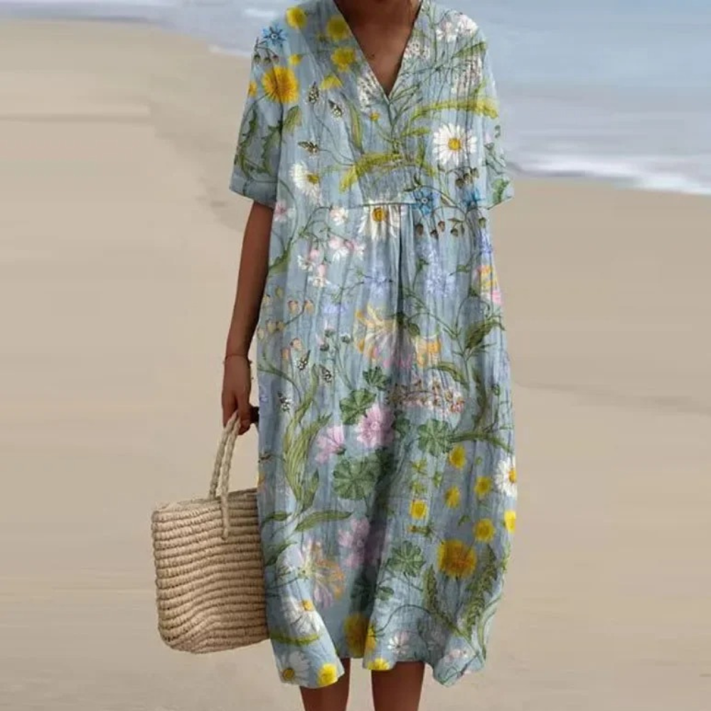 "Farverig forårskjole til kvinder med livligt blomstret print, ideel til elegante og afslappede lejligheder"