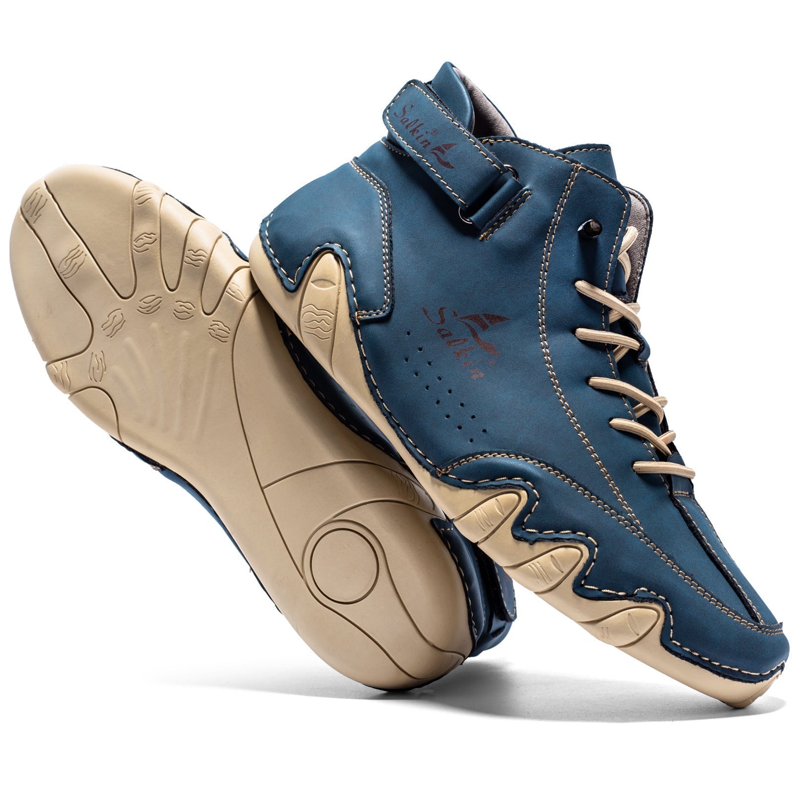 "Fleksible og letvægtige barfodssko til kvinder, grå og mørkeblå, designet til naturlig bevægelse ved udendørs aktiviteter."