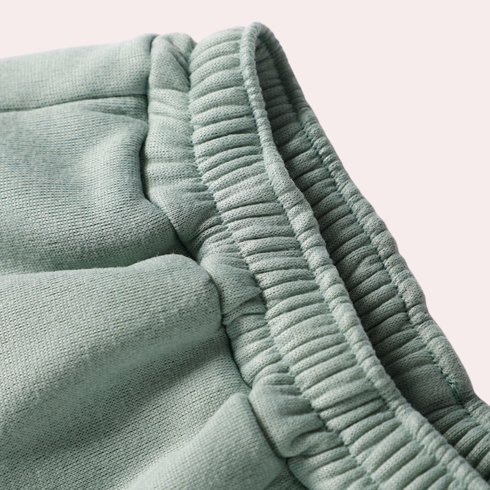 Grønt Keelin træningssæt til damer, stilfuldt joggingtøj med jakke og bukser, ideelt til både sport og afslapning.