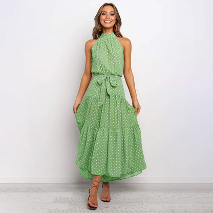 "Gul halterneck A-linje sommerkjole med taljebånd, ærmeløs og elegant design til både hverdag og festlige anledninger."