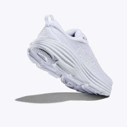 "Hvide sporty sneakers i letvægtsdesign med elegant og moderne udseende, mesh-materiale og reflekterende detaljer."