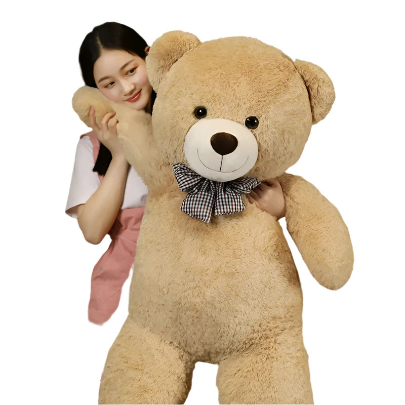 "Kæmpe bamse 105cm med blød plys, charmerende design i lysebrun, perfekt til børns leg og hygge"