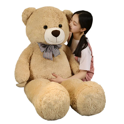 "Kæmpe bamse 105cm med blød plys, charmerende design i lysebrun, perfekt til børns leg og hygge"