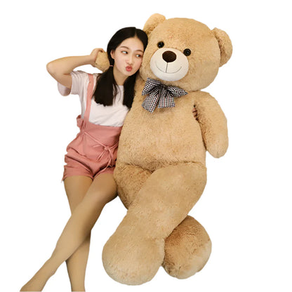 "Kæmpe bamse 105cm med blød plys, charmerende design i lysebrun, perfekt til børns leg og hygge"