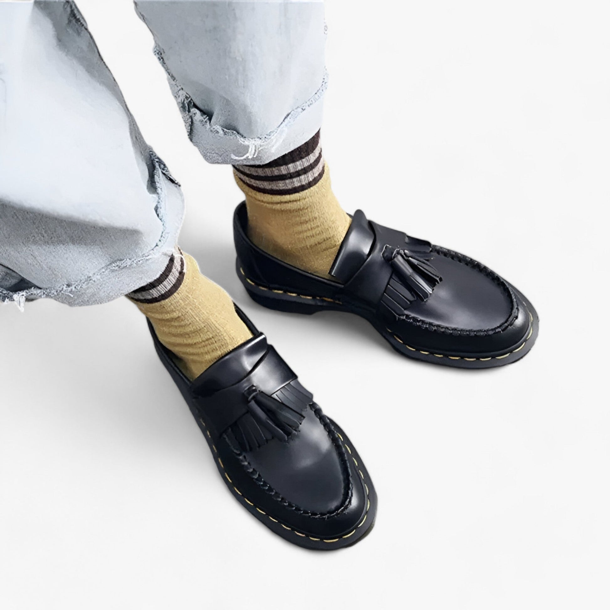 "Klassiske herre loafers i brun med kvast, tidløst design og bløde såler, perfekt til både formelle og casual outfits."