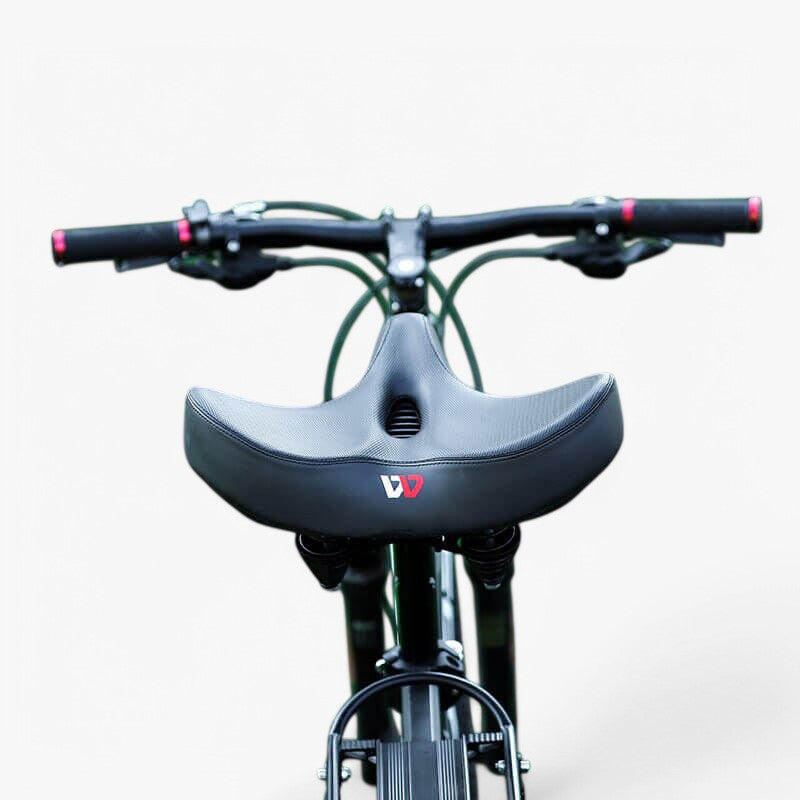 "Komfortabel cykelpude med tyk skum, ergonomisk design, sort farve, egnet til lange cykelture for øget komfort."