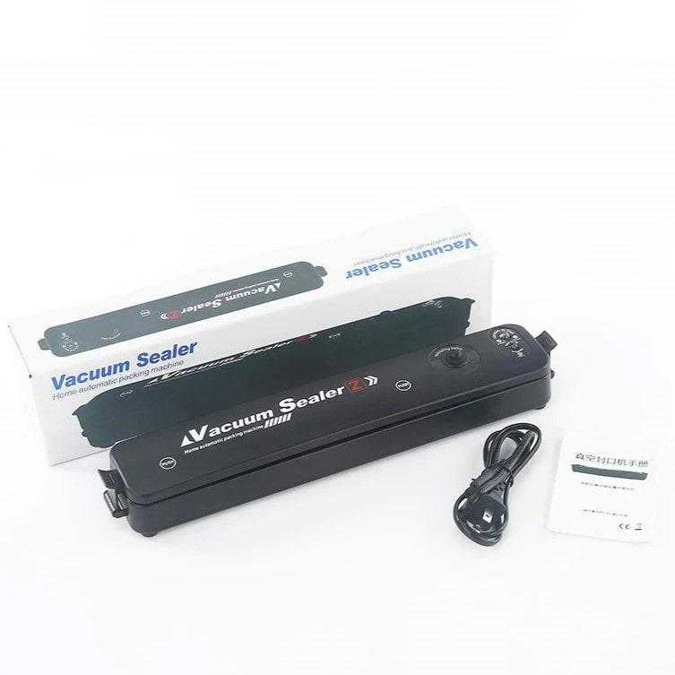 "Kompakt AirFresh vakuumpakkemaskine i brug, bevarer mad friskere og længere, pladsbesparende design."