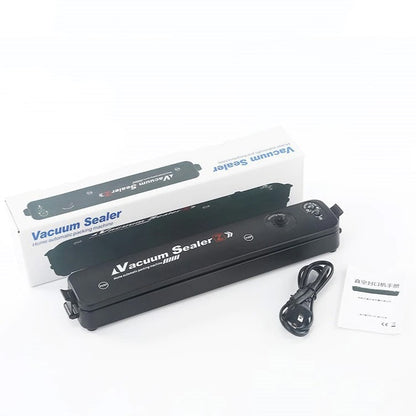 "Kompakt AirFresh vakuumpakkemaskine i brug, bevarer mad friskere og længere, pladsbesparende design."