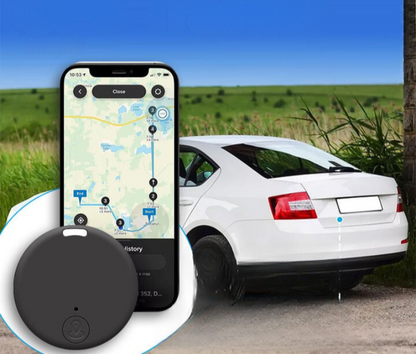 "Kompakt GPS tracker med magnetisk base, sort diskret design, sikrer bilovervågning og realtidssporing."