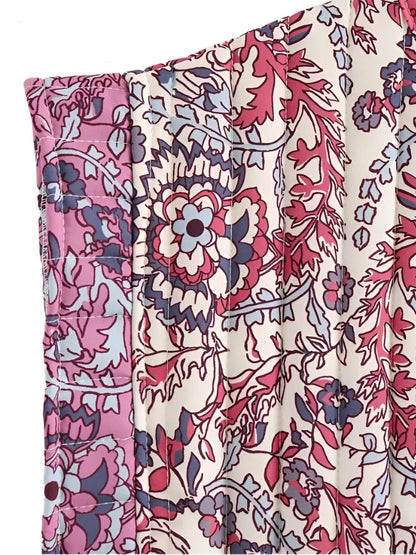 Let quiltet kvindevest uden ærmer, ideel til lag-på-lag-styling, med raffineret design for hverdag og fest.